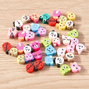 Colorful polymer clay animal beads including panda and frog shapes for DIY jewelry making