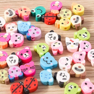 Mix of colorful polymer clay animal beads including pandas and cats for DIY jewelry