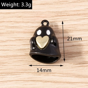 Detail view of a 21mm matte black ghost charm with gold heart and dimensions shown