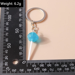 Lollipop keychain in translucent blue resin with metal ring, weighing 6.2g detail
