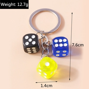 Detail view of acrylic dice keychain with weight 12.7g and 1.4cm size specifications