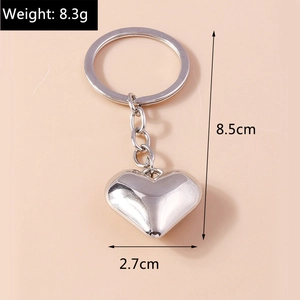 Dimensioni del portachiavi a cuore argento lucido con lunghezza 8,5cm e peso 8,3g