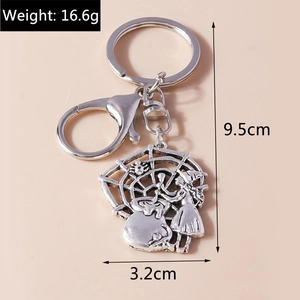 Detail view of witch themed keychain showing weight 16.6g and size 9.5cm dimensions