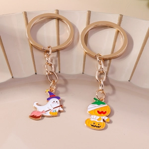 Halloween keychain set featuring ghost witch and mummy pumpkin with gold plated enamel