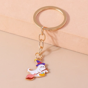 Halloween keychain featuring a cute ghost with a witch hat and pumpkin on a stylish stand