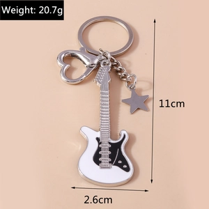 Detail view of cartoon electric guitar keychain with dimensions and heart shaped clasp