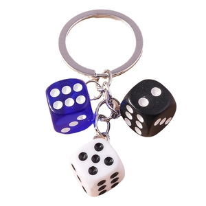 Creative dice keychain with acrylic resin blocks in blue, black, and white colors