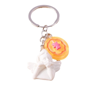Cute angel keychain with white resin cherub and pink star charm on silver ring