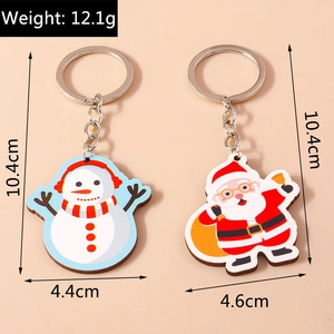 Dimensions et poids détaillés du lot de porte-clés de Noël bonhomme de neige et Père Noël