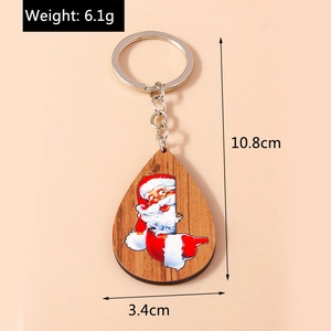 Dettaglio portachiavi in legno a goccia con Babbo Natale e dimensioni del prodotto