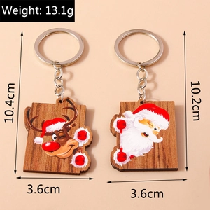 Detailansicht der 13,1g leichten Holz-Weihnachtsschlüsselanhänger mit Weihnachtsmann-Motiv
