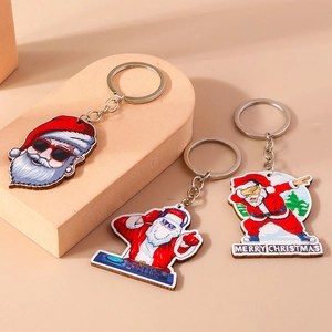 Wooden Christmas Santa keychain set featuring cool DJ and skiing styles for holiday gifts