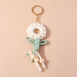 Handmade knitted sunflower keychain with white cotton rope, wood beads and gold ring