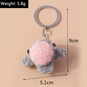 Detailed view of handmade grey felt animal charm with dimensions and 5.8g weight