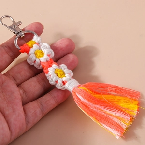 Handmade woven flower keychain with colorful gradient tassel and silver lobster clasp
