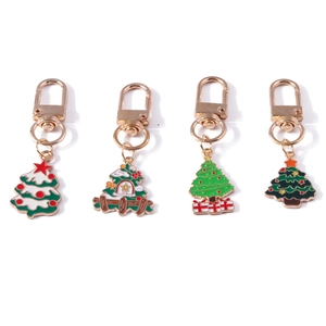 Set of four cute alloy Christmas tree keychains with colorful enamel and gold clasps