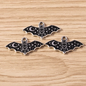 Gothic bat charms in black enamel with moon and star patterns for DIY jewelry making