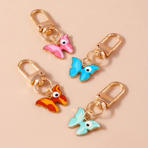 Lot de porte-clés papillon colorés avec motifs d'yeux et fermoirs mousquetons dorés
