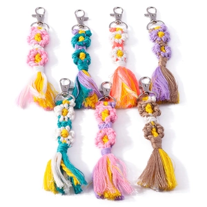 Handmade bohemian floral woven keychains with colorful tassels and silver lobster clasps
