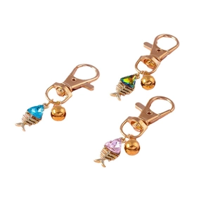 Three-piece fish bone bell keychain set with blue, green, and pink crystals