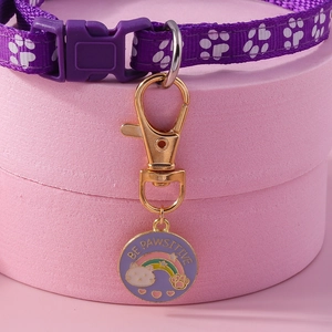 Purple woven pet collar with Be Pawsitive rainbow cat pendant and golden lobster clasp