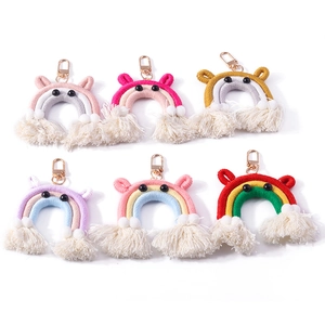 Handmade woven rainbow animal keychains with colorful cotton rope tassels and gold clips