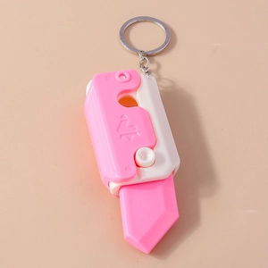 Cute pink and white telescopic carrot knife keychain toy for keys or bag decor