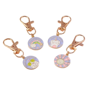 Set of four cute enamel rainbow sun cat pendants with rose gold metal keychains