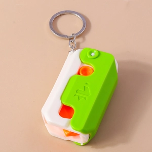 Creative 3D gravity carrot knife keychain toy in green and orange folding design