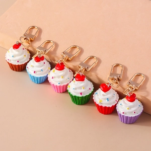 6er-Set bunte Cupcake-Schlüsselanhänger mit Sahnehaube und goldenem Karabinerhaken