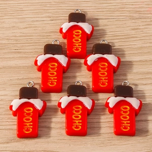 7Pcs realistic resin chocolate bar pendants with silver rings on wooden surface