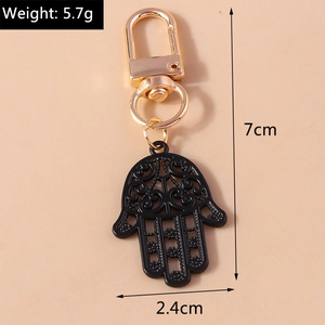 Détail du porte-clés main de Hamsa montrant les dimensions et le fermoir mousqueton
