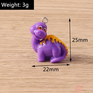 Detail shot of a cute purple dinosaur charm with 25mm height and 22mm width specs