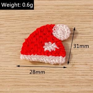 Detail view of mini crochet Christmas hat showing dimensions 28x31mm and 0.6g weight