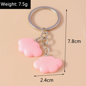Detailed view of pink resin cloud charms keychain with 7.5g weight and 7.8cm total length