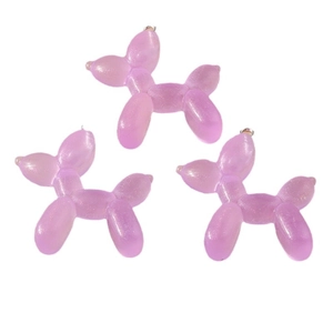 Three purple pearlescent balloon dog pendants with metal loops for creative DIY jewelry making