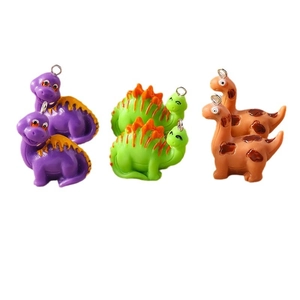 Set of six cute cartoon dinosaur resin pendants in purple green and orange for DIY jewelry