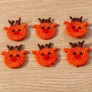 Detailed view of six knitted reindeer patches for Christmas DIY crafts and clothing decor