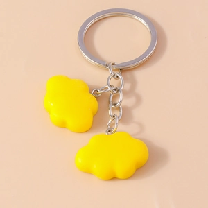 Cloud-shaped resin keychain with double yellow pendants and polished silver metal ring
