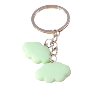 Cloud shaped resin keychain with silver ring and light green pendants on white background