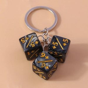 Creative black dice keychain with gold numbers and marble texture on metal ring