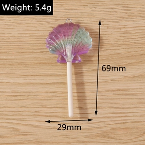 Detailed view of colorful shell lollipop pendant with size measurements and 5.4g weight