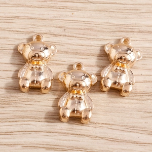 DIY gold teddy bear pendants with bowties for jewelry making and accessory crafts