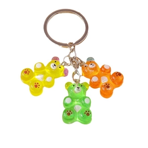 Three-in-one resin bear keychain in yellow green and orange with silver keyring