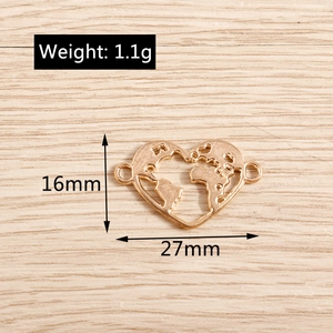 Macro shot of rose gold alloy heart world map pendant with 1.1g weight and 16x27mm dimensions
