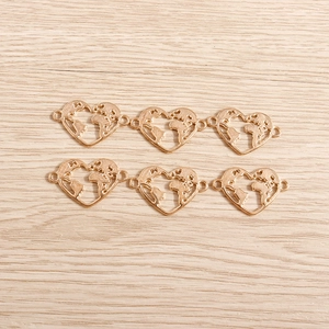 Set of six heart-shaped world map pendants in gold-plated alloy for DIY jewelry