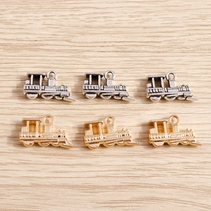 Retro steam locomotive metal pendants in gold and silver finishes for DIY jewelry making