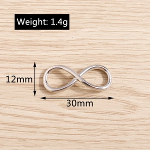 Detailed size view of silver infinity symbol charms 30mm width for DIY jewelry making