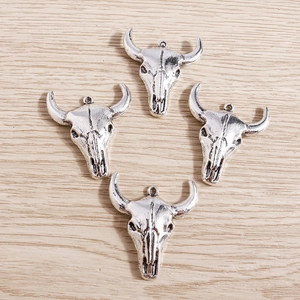 Set of 4 vintage bull skull pendants in antique silver finish for DIY jewelry making