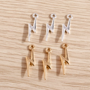 Polished alloy lightning bolt charms in gold and silver finish for DIY jewelry making